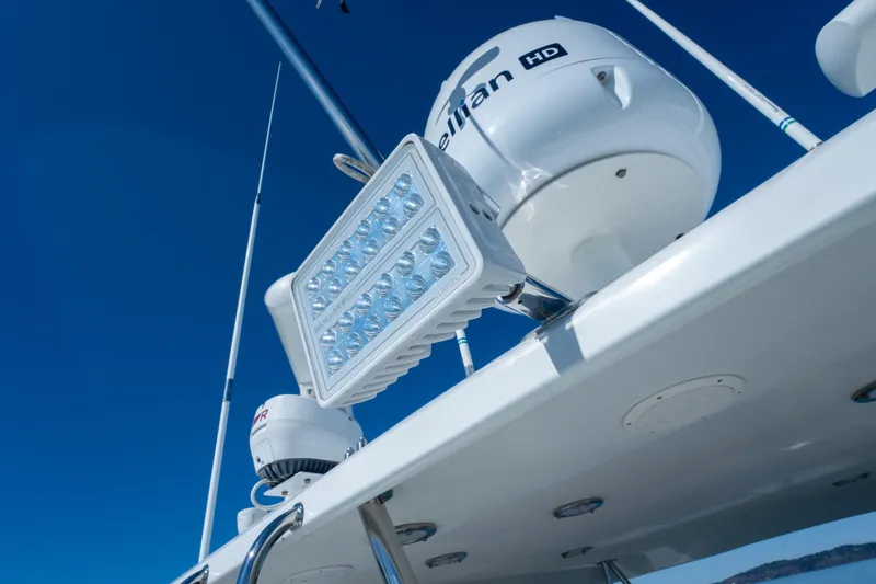 Slide: The Image of Radar and lighting equipment on 2003 Ocean Alexander 700 Classicco yacht against clear blue sky. - 48