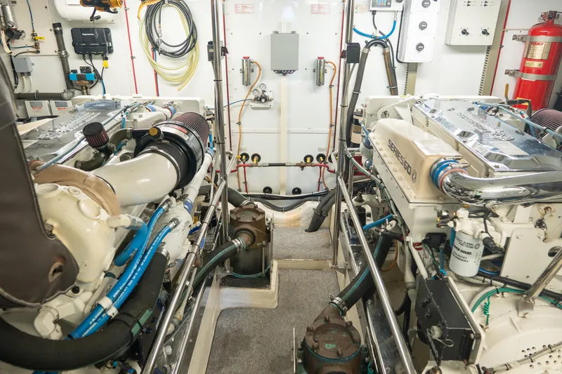 Slide: The Image of Engine room of 2003 Ocean Alexander 700 Classicco yacht, featuring twin diesel engines. - 50