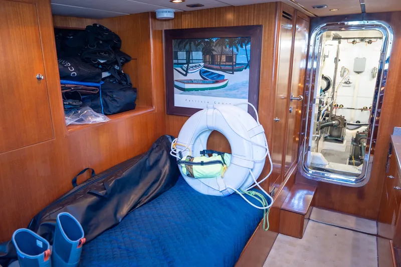 Slide: The Image of Cozy cabin interior of 2003 Ocean Alexander 700 Classicco yacht with safety equipment. - 55
