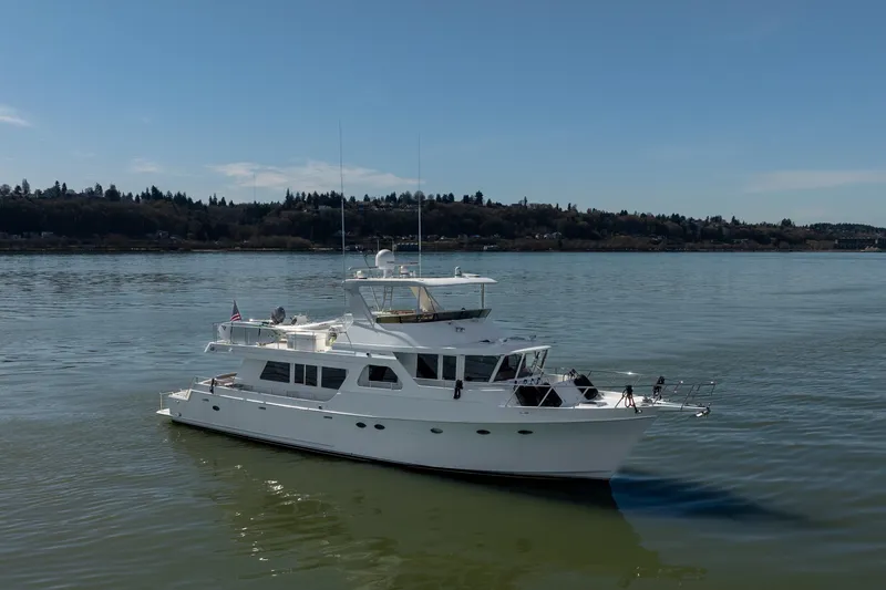 Slide: The Image of 2003 Ocean Alexander 700 Classicco yacht cruising on calm waters. - 60