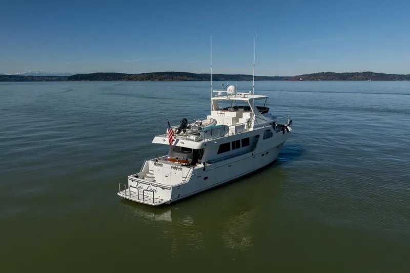 Slide: The Image of Ocean Alexander 700 Classicco yacht from 2003 cruising on calm waters. - 62