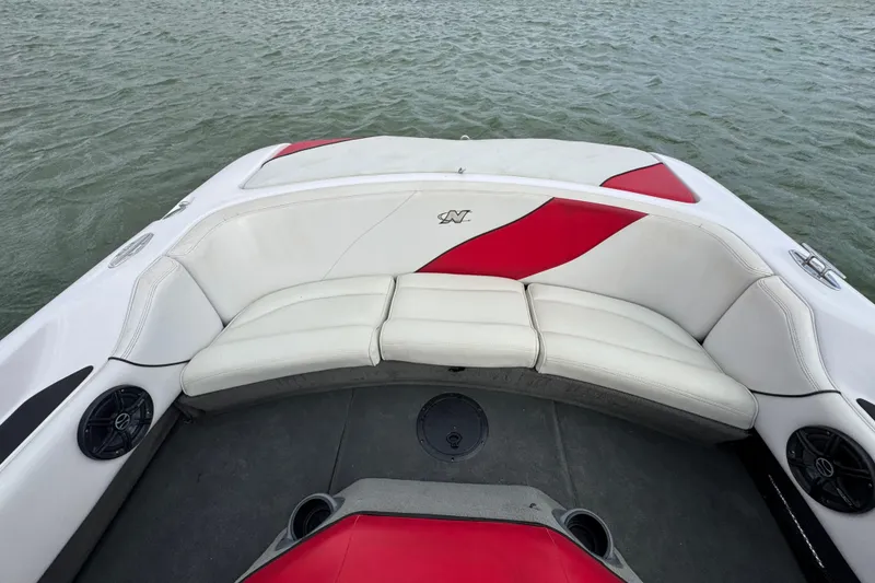 Slide: The Image of 2000 Correct Craft Super Air Nautique boat interior with white and red seating. - 20
