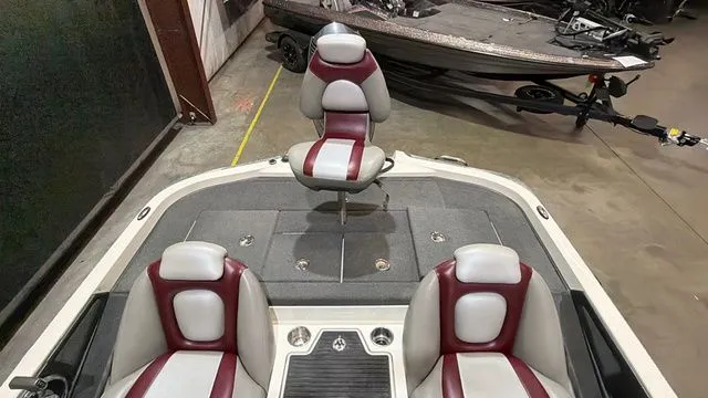 Slide: The Image of Interior of a 2015 Ranger Z118C boat with Evinrude E-Tec 150 engine. - 11