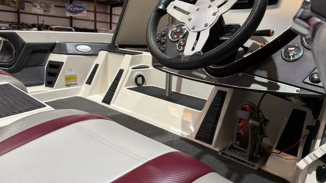 Slide: The Image of Interior of a 2015 Ranger Z118C boat with Evinrude E-Tec 150 engine. - 20