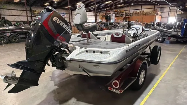 Slide: The Image of 2015 Ranger Z118C boat with Evinrude E-Tec 150 engine in warehouse. - 5