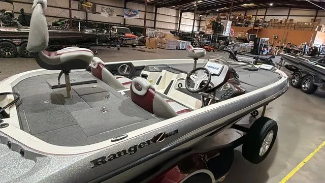 Slide: The Image of 2015 Ranger Z118C boat with Evinrude E-Tec 150 in showroom. - 6
