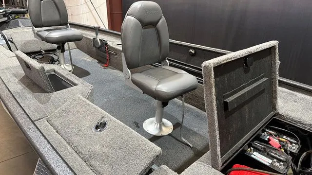 Slide: The Image of Interior view of a 2015 Xpress XP16PF boat with seating. - 10