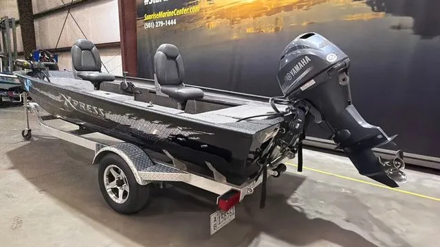 Slide: The Image of 2015 Xpress XP16PF boat with Yamaha 40 engine in warehouse. - 3
