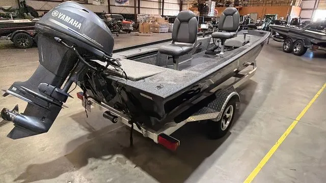 Slide: The Image of 2015 Xpress XP16PF boat with Yamaha 40 engine in warehouse. - 5