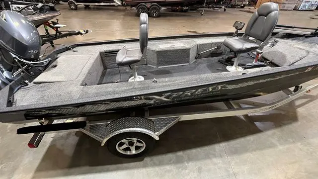 Slide: The Image of 2015 Xpress XP16PF boat with Yamaha 40 engine on trailer. - 6