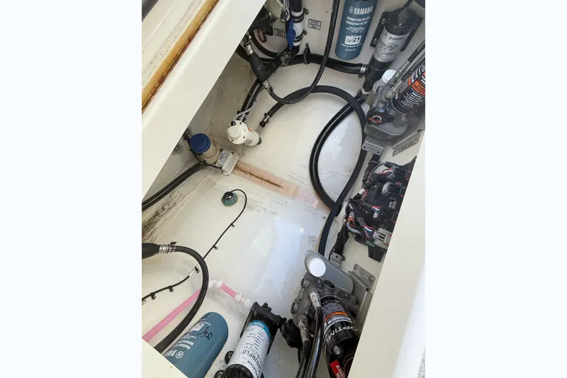 Slide: The Image of Interior view of 2022 Regulator 23 boat engine compartment. - 19
