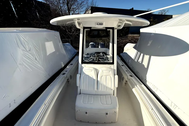Slide: The Image of 2022 Regulator 23 boat with center console and seating area. - 5