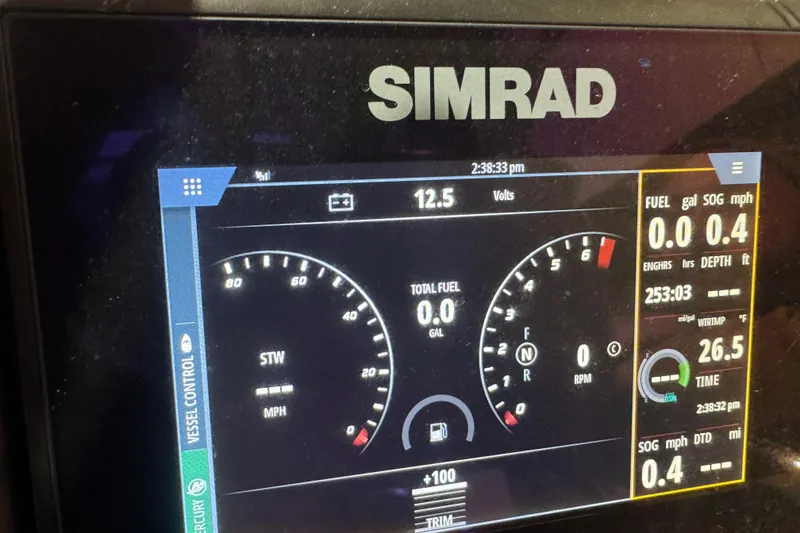 Slide: The Image of Simrad display on 2018 Trifecta SS 21FC showing fuel, speed, and engine data. - 14