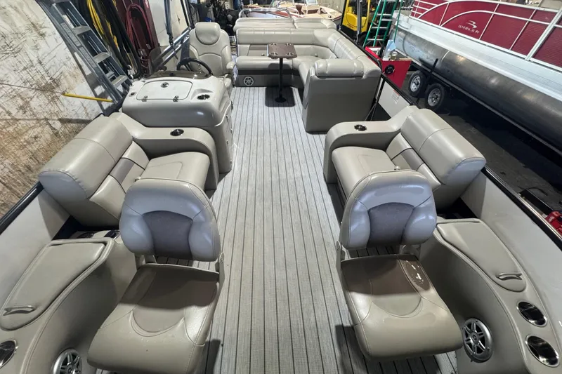 Slide: The Image of 2018 Trifecta SS 21FC pontoon boat interior with plush seating and modern design. - 7