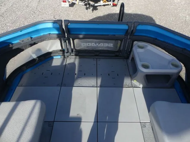 Slide: The Image of Interior of 2022 Sea-Doo Switch® Cruise 21 with seating and cup holders. - 14