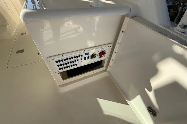 Slide: The Image of Control panel on 2011 Pursuit DC 265 Dual Console boat interior. - 28