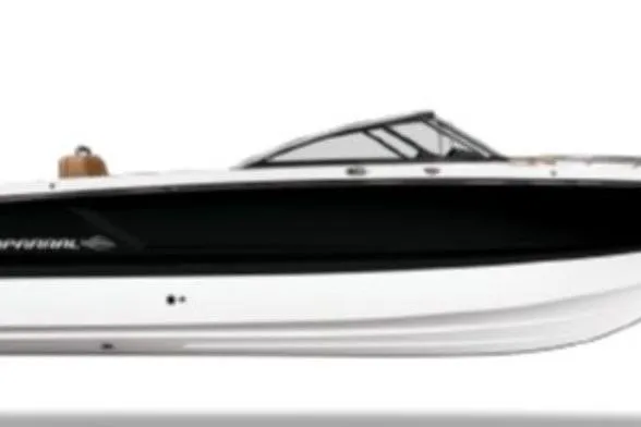 Slide: The Image of 2026 Chaparral SSX 4 boat, sleek black and white design, side view. - 3