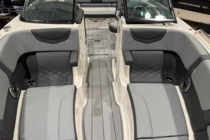 Slide: The Image of 2026 Chaparral 270 OSX boat interior with gray seating and modern design. - 20
