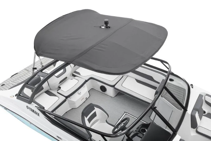 Slide: The Image of 2026 Yamaha Boats AR195 with canopy, showcasing sleek interior and modern design. - 16