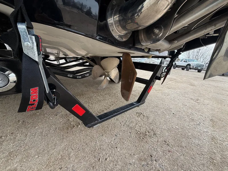 Slide: The Image of Underside of a 2021 Malibu Wakesetter 21 MLX with propeller. - 10