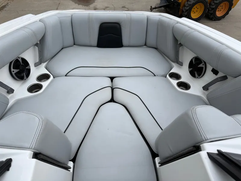Slide: The Image of Interior of 2021 Malibu Wakesetter 21 MLX with gray upholstery. - 14