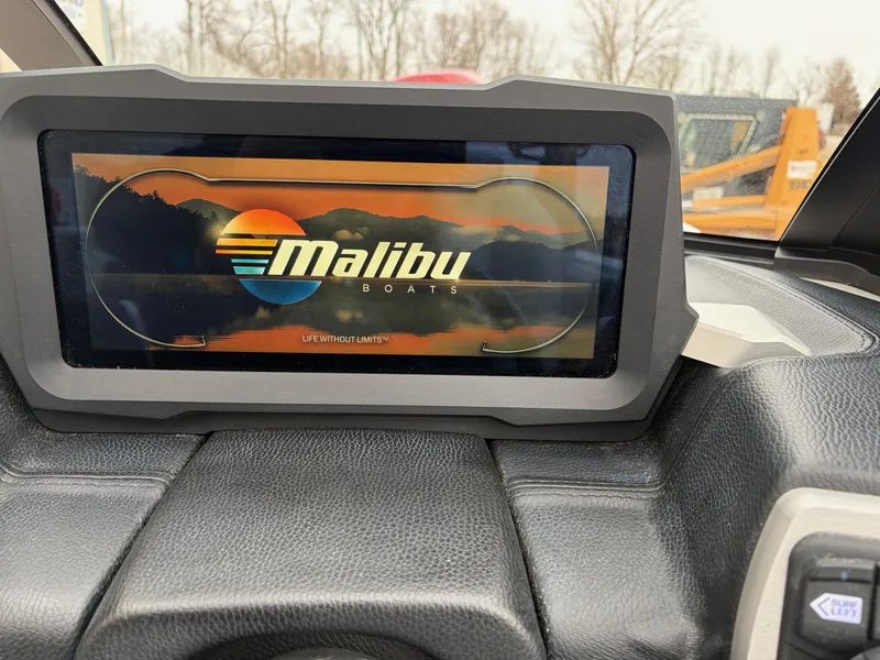 Slide: The Image of 2021 Malibu Wakesetter 21 MLX display featuring logo and slogan. - 17