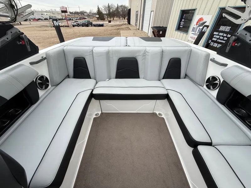 Slide: The Image of Interior of 2021 Malibu Wakesetter 21 MLX with gray upholstery. - 27