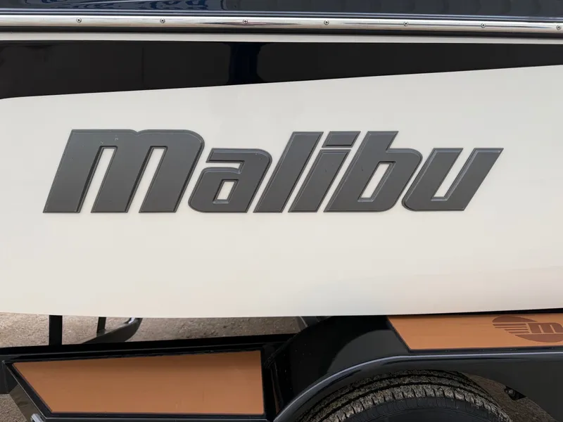 Slide: The Image of Malibu Wakesetter 21 MLX 2021 boat logo on white background. - 3