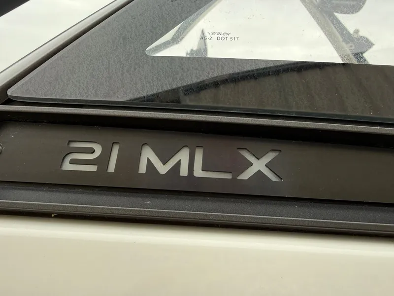 Slide: The Image of Close-up of 2021 Malibu Wakesetter 21 MLX emblem. - 5