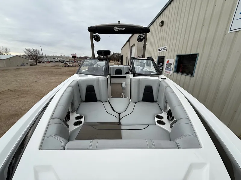 Slide: The Image of 2021 Malibu Wakesetter 21 MLX boat with gray seating. - 6