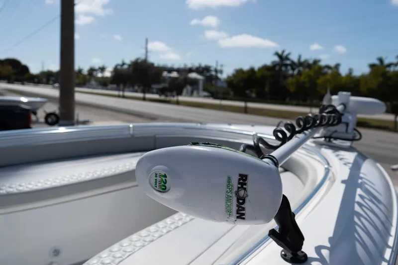 Slide: The Image of 2023 Contender 24 Sport boat with Rhodan GPS anchor system on a sunny day. - 6