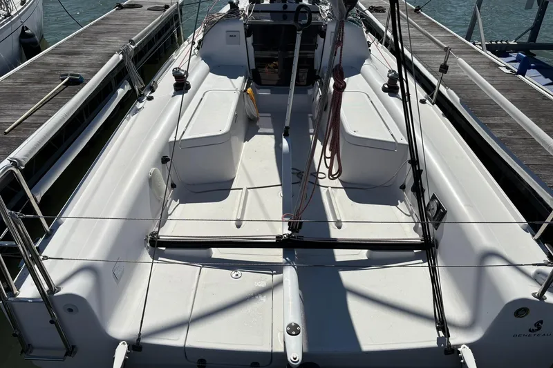 Slide: The Image of 2024 Beneteau First 27 sailboat cockpit, docked, showcasing sleek design and modern features. - 3