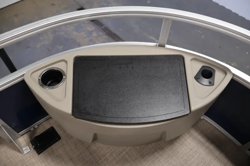 Slide: The Image of 2023 Sun Tracker Fishin' Barge 20 DLX fishing station with cup holder and measuring board. - 14