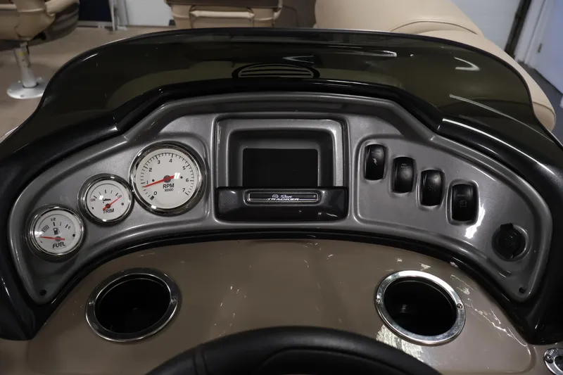 Slide: The Image of Dashboard of 2023 Sun Tracker Fishin' Barge 20 DLX with gauges and controls. - 29