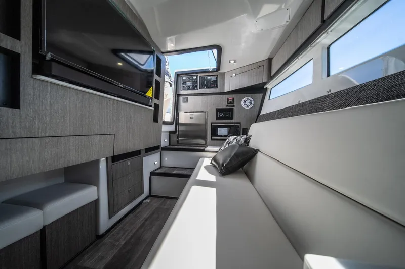 Slide: The Image of Luxurious interior of 2026 Monterey 378SS Super Sport boat with modern amenities. - 16