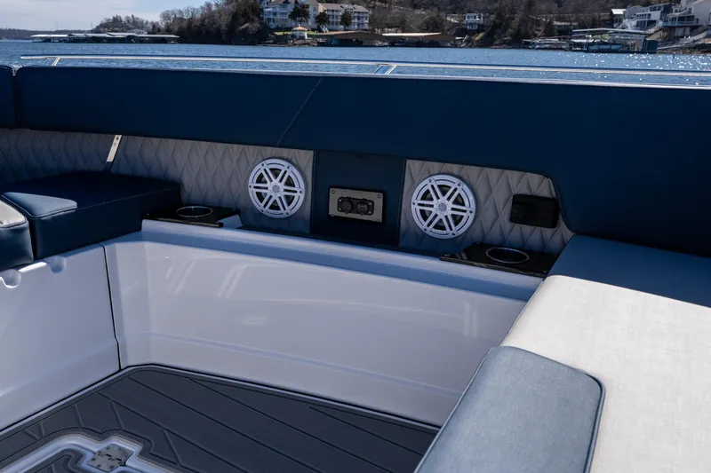 Slide: The Image of Interior of 2026 Monterey 378SS Super Sport boat with speakers and seating. - 20