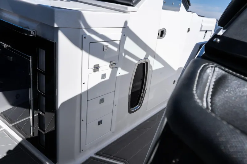 Slide: The Image of 2026 Monterey 378SS Super Sport boat interior with sleek cabinetry and modern design. - 25