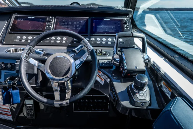Slide: The Image of Cockpit of 2026 Monterey 378SS Super Sport boat with advanced controls and navigation systems. - 29