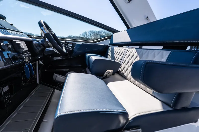Slide: The Image of Interior of 2026 Monterey 378SS Super Sport boat with luxurious seating and steering wheel. - 30