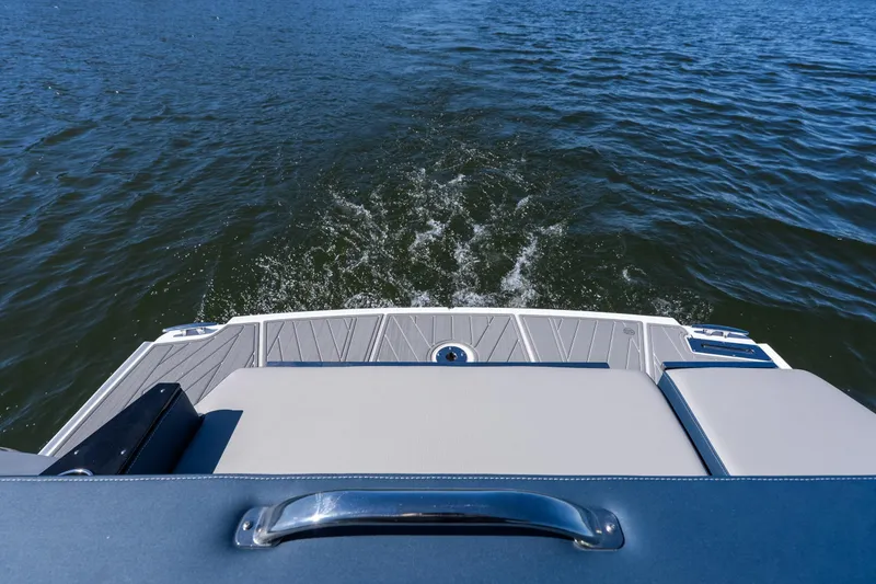 Slide: The Image of 2026 Monterey 378SS Super Sport boat on water, rear view with swim platform. - 32