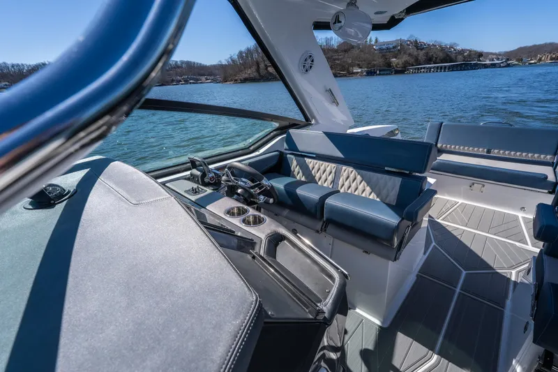Slide: The Image of Interior of 2026 Monterey 378SS Super Sport boat with luxurious seating and modern dashboard. - 34