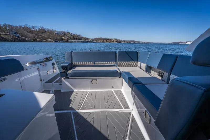 Slide: The Image of Luxurious seating on 2026 Monterey 378SS Super Sport boat, overlooking serene lake view. - 35