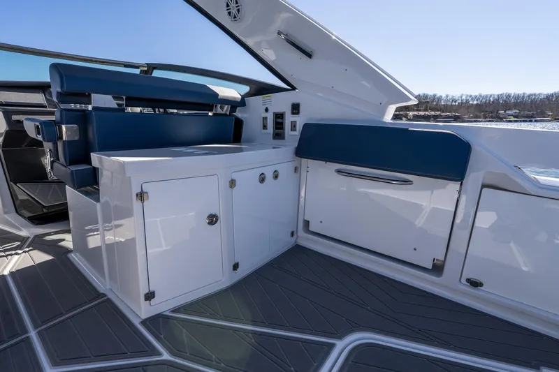 Slide: The Image of Interior of 2026 Monterey 378SS Super Sport boat with sleek seating and cabinetry. - 36