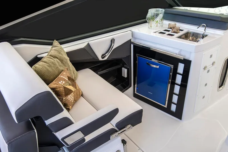 Slide: The Image of Manufacturer Provided Image: 2025 Monterey 378SS Super Sport interior with seating, kitchenette, and modern design elements. - 4