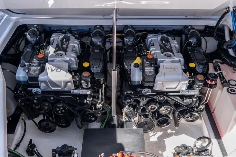 Slide: The Image of Twin V8 engines in a 2026 Monterey 378SS Super Sport boat engine compartment. - 47