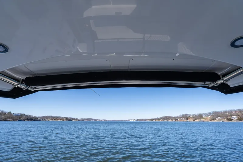 Slide: The Image of View from a 2026 Monterey 378SS Super Sport boat on a serene lake. - 50