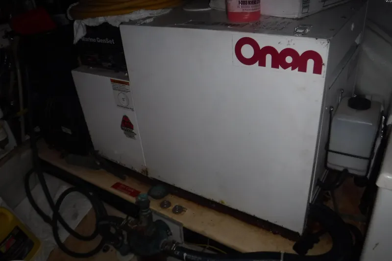 Slide: The Image of Onan marine generator in a 2002 Nordic Tug 37 engine room. - 22