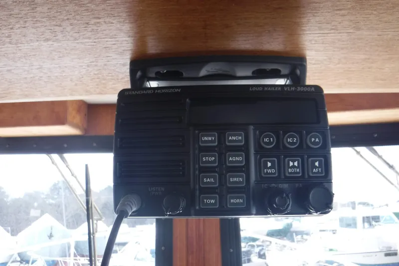 Slide: The Image of Standard Horizon marine radio on 2002 Nordic Tug 37 boat dashboard. - 29
