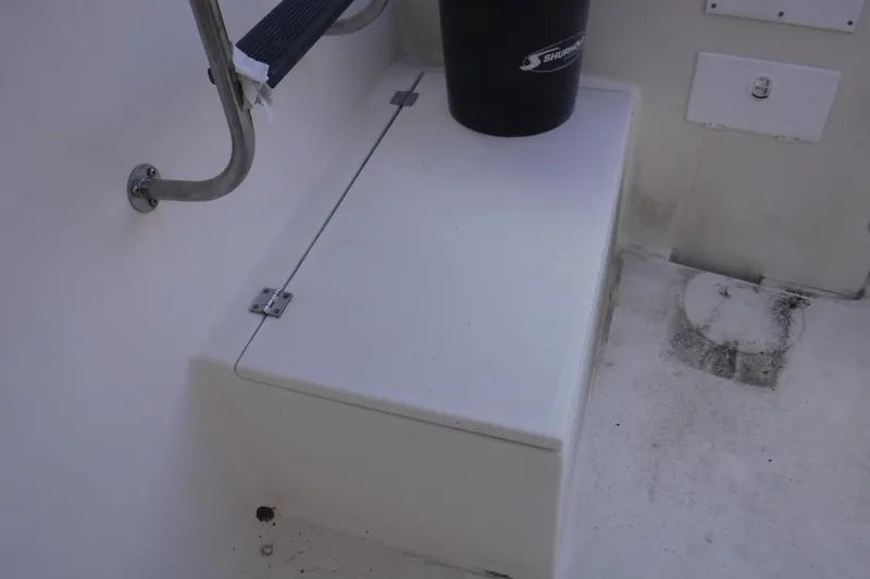 Slide: The Image of Nordic Tug 37 (2002) boat deck with storage compartment and railing. - 6