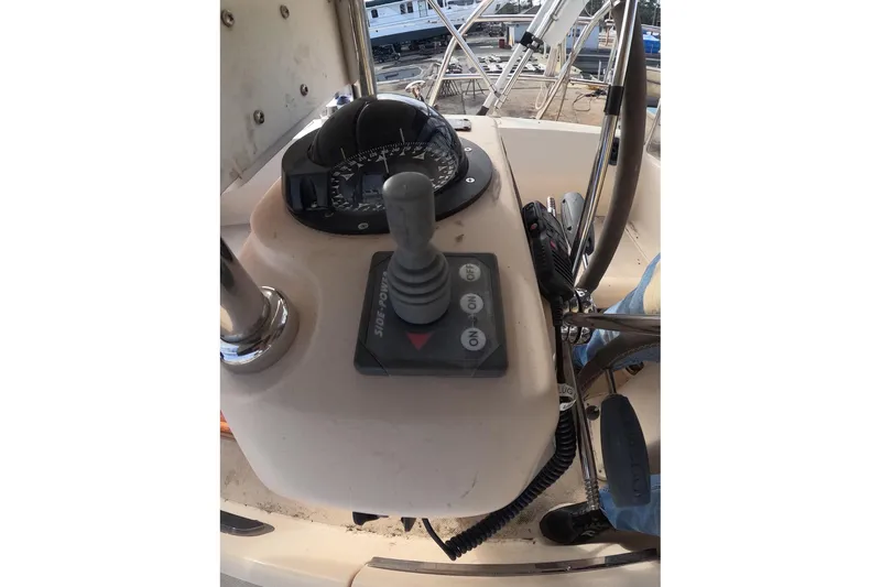 Slide: The Image of Control panel of 2005 Island Packet 370 sailboat with compass and joystick. - 25